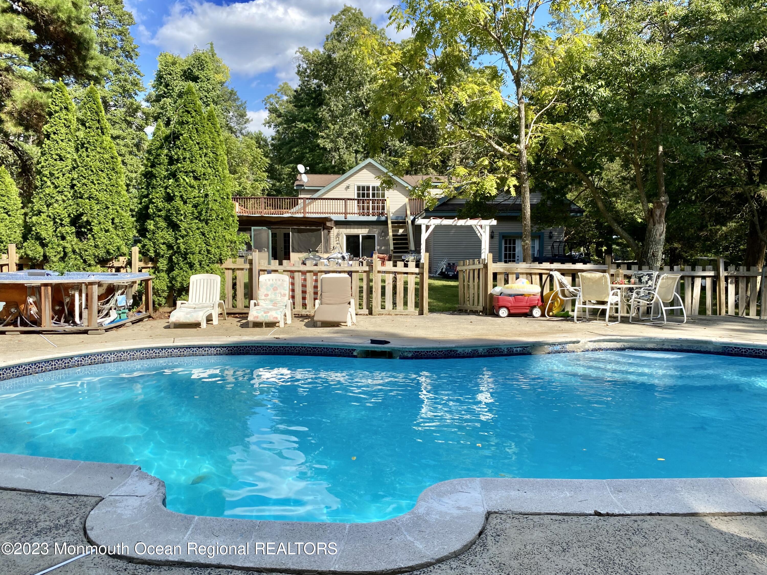 113 Maple Avenue Tuckerton, NJ 08087 - Photo 52 of 69 a view of a swimming pool with an outdoor seating