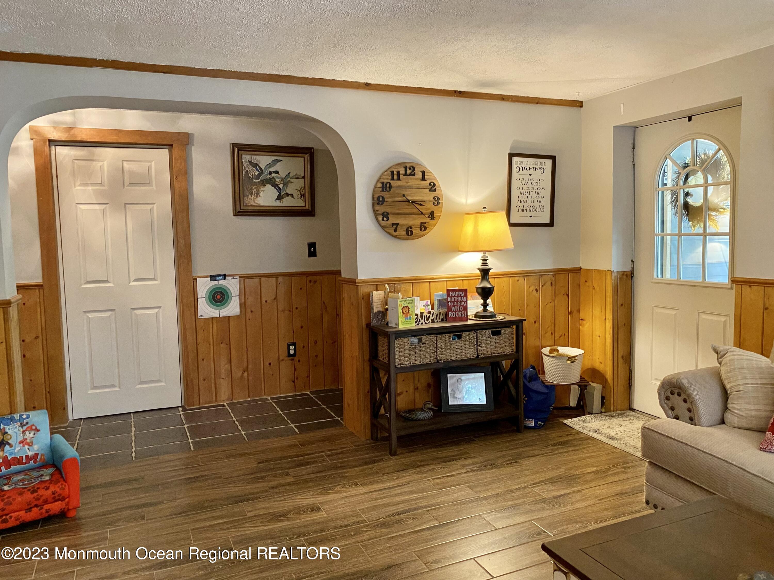 113 Maple Avenue Tuckerton, NJ 08087 - Photo 7 of 69 a living room with furniture and a fireplace
