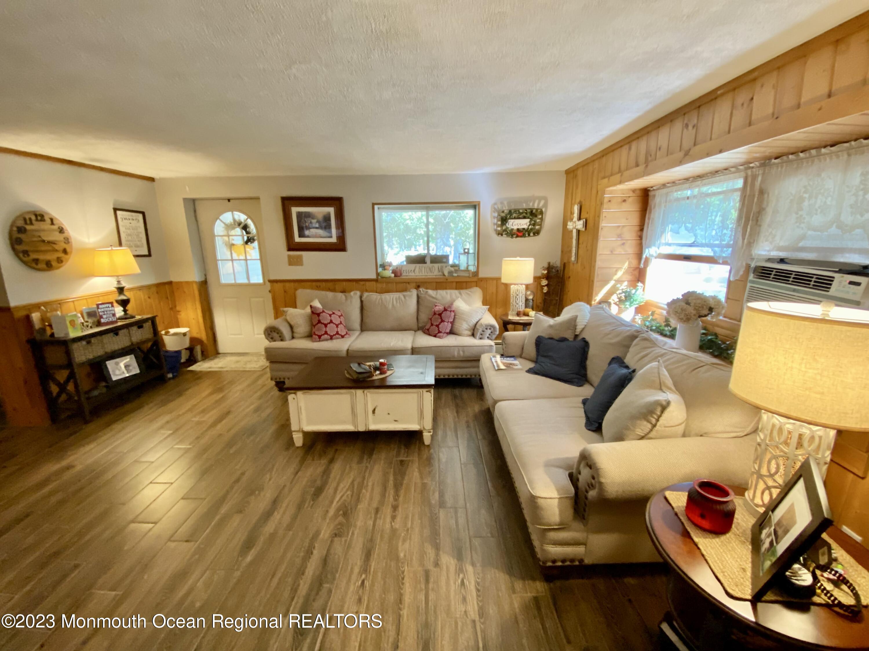 113 Maple Avenue Tuckerton, NJ 08087 - Photo 8 of 69 a living room with furniture and a flat screen tv