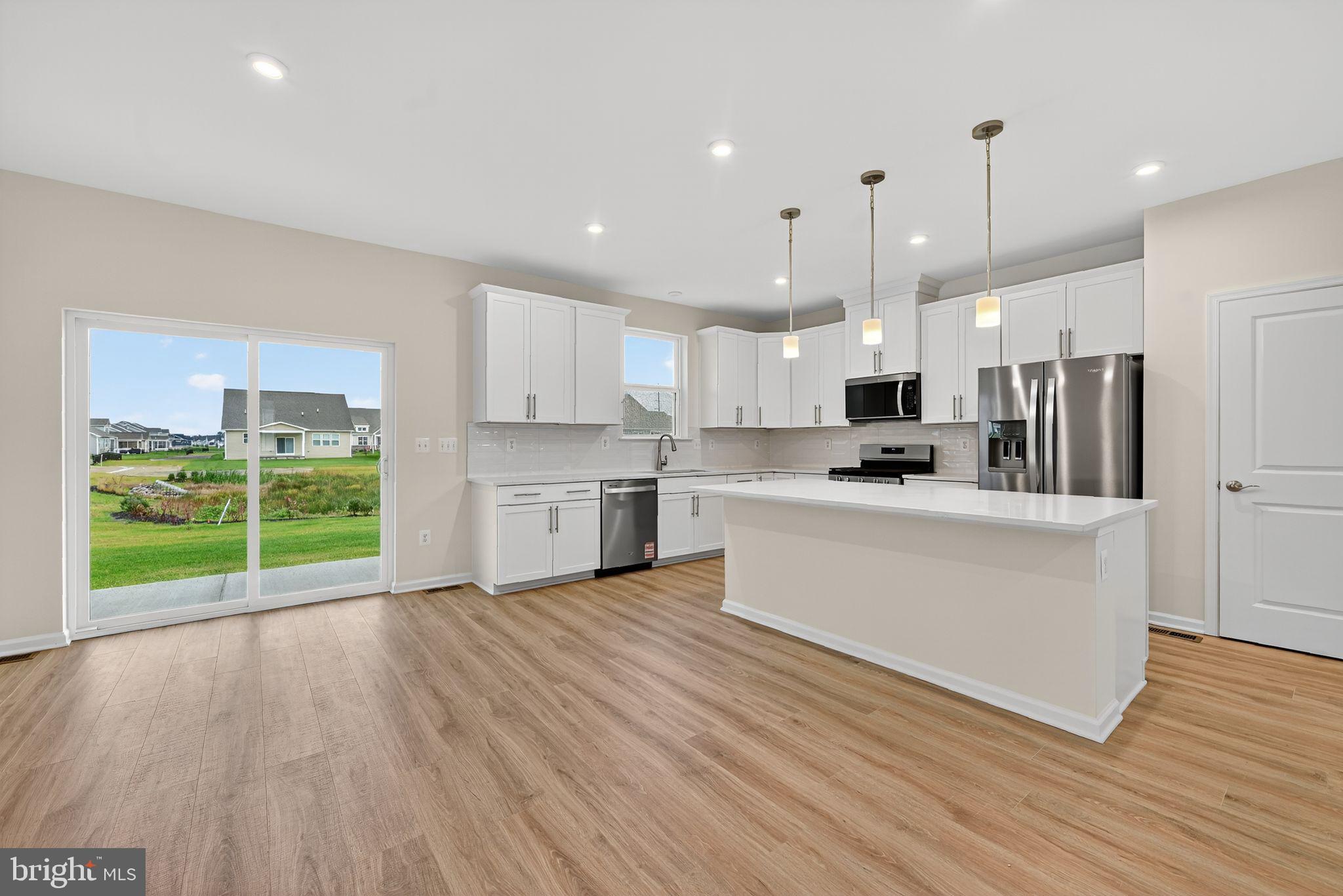 25013 Cypress Court Lewes, DE 19958 - Photo 12 of 24 a view of kitchen with wooden floor