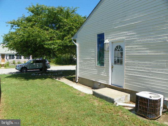 187 Inlet Drive Pasadena, MD 21122 - Photo 15 of 29 a view of backyard with sitting area