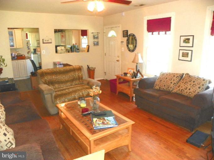 187 Inlet Drive Pasadena, MD 21122 - Photo 3 of 29 a living room with furniture and a window