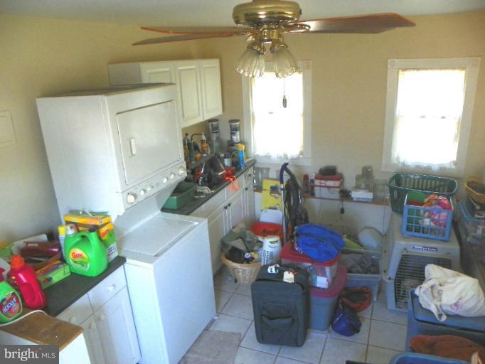 187 Inlet Drive Pasadena, MD 21122 - Photo 22 of 29 a kids room with toys and a chandelier