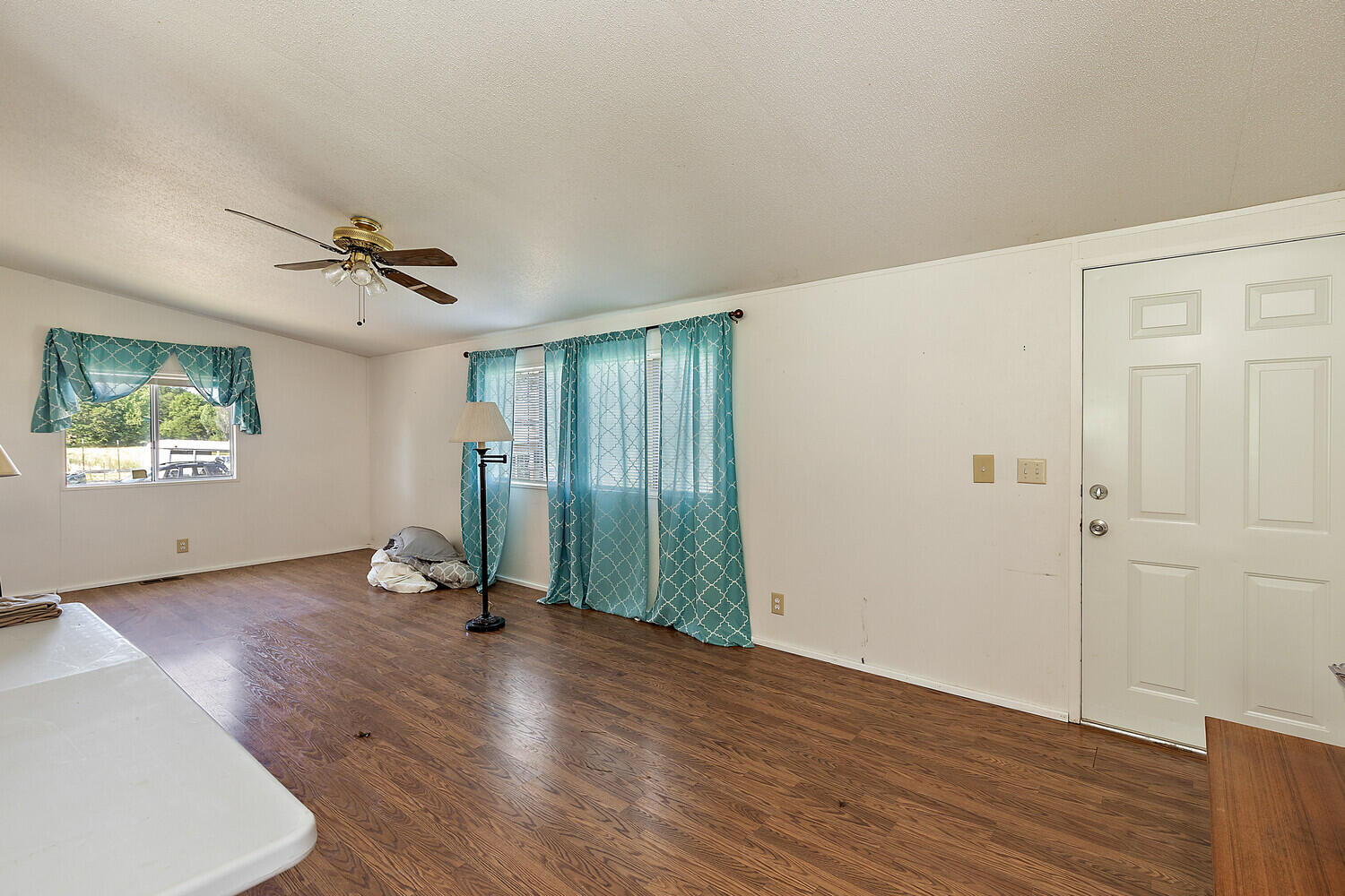 10710 Meadows Road White City, OR 97503 - Photo 30 of 46 wooden floor in an empty room with a window
