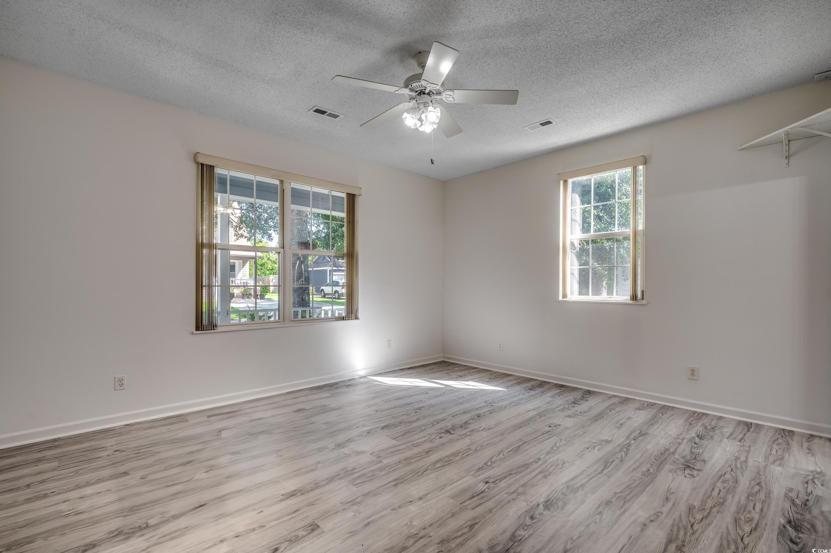 4261 Brook Drive Murrells Inlet, SC 29576 - Photo 18 of 39 Spare room with light hardwood / wood-style floors