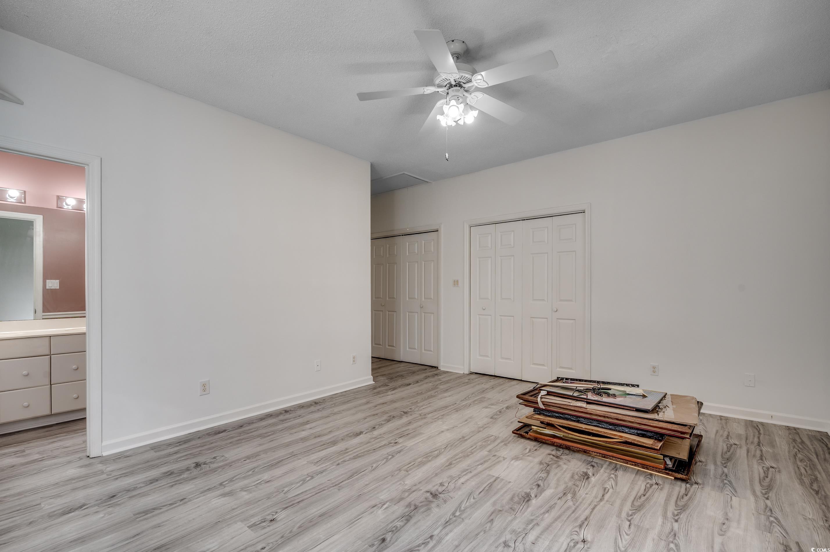 4261 Brook Drive Murrells Inlet, SC 29576 - Photo 21 of 39 Empty room featuring light wood-type flooring and