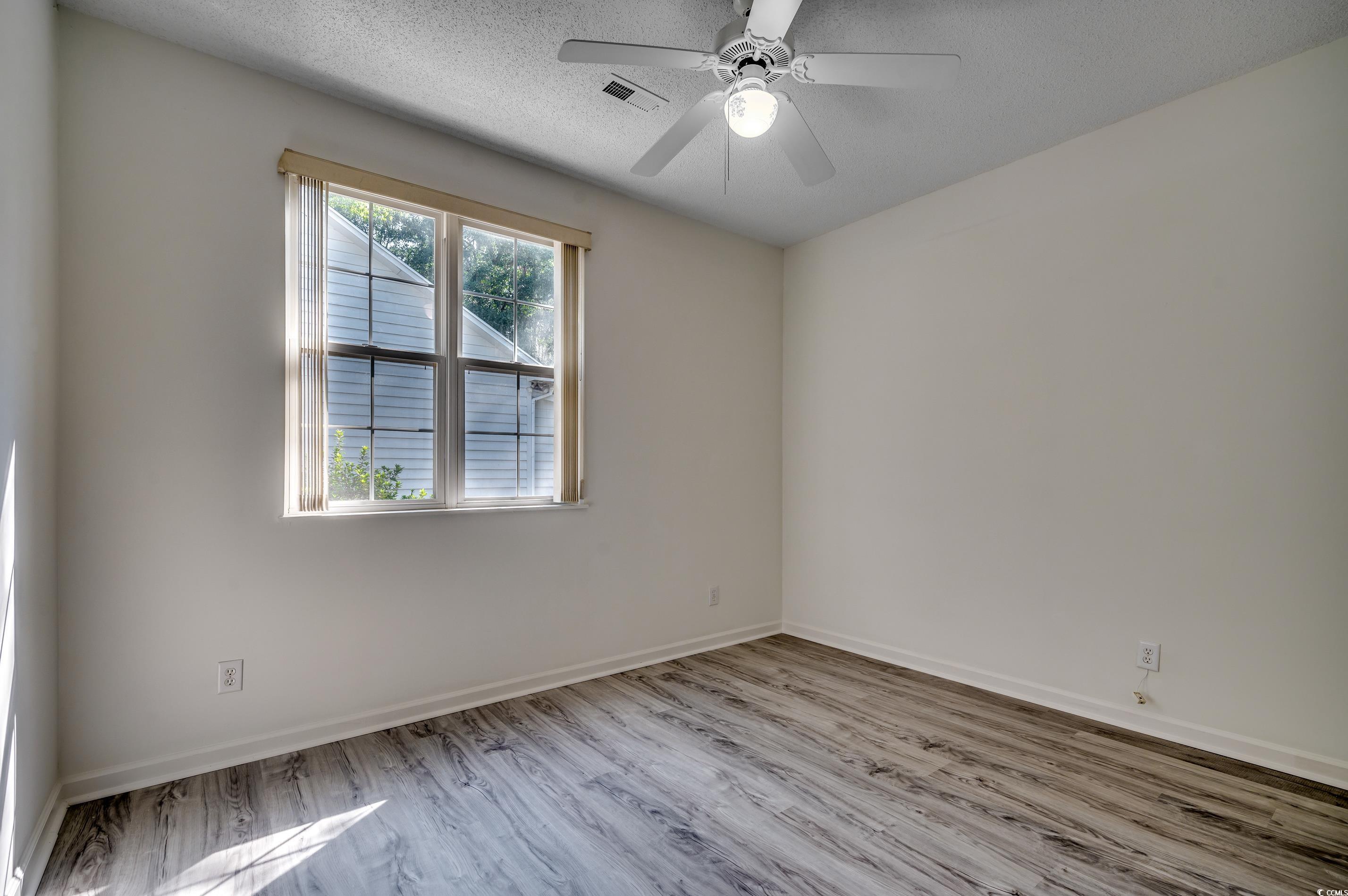 4261 Brook Drive Murrells Inlet, SC 29576 - Photo 23 of 39 Unfurnished room featuring ceiling fan, a textured
