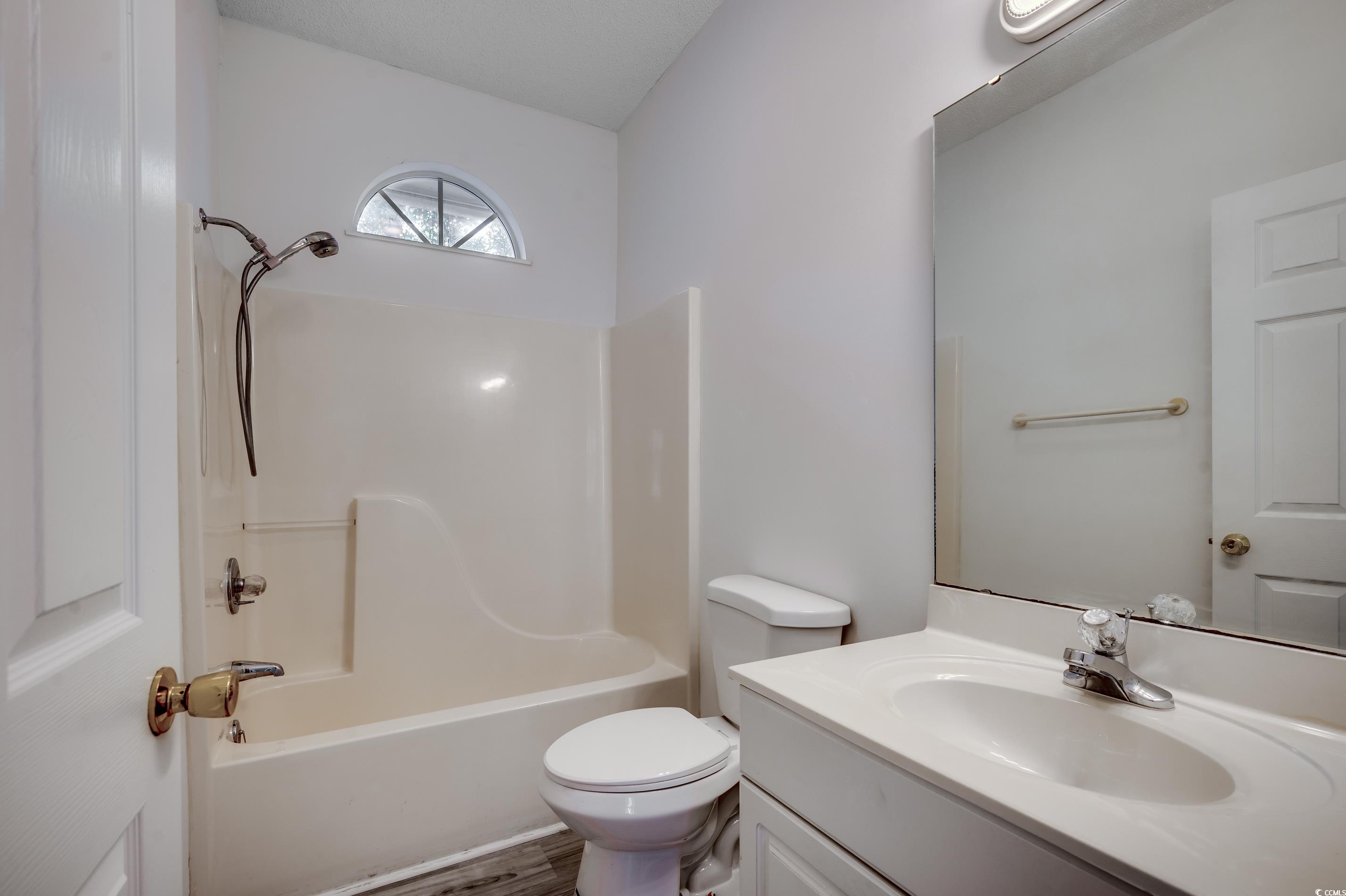4261 Brook Drive Murrells Inlet, SC 29576 - Photo 24 of 39 Full bathroom featuring vanity, hardwood / wood-st