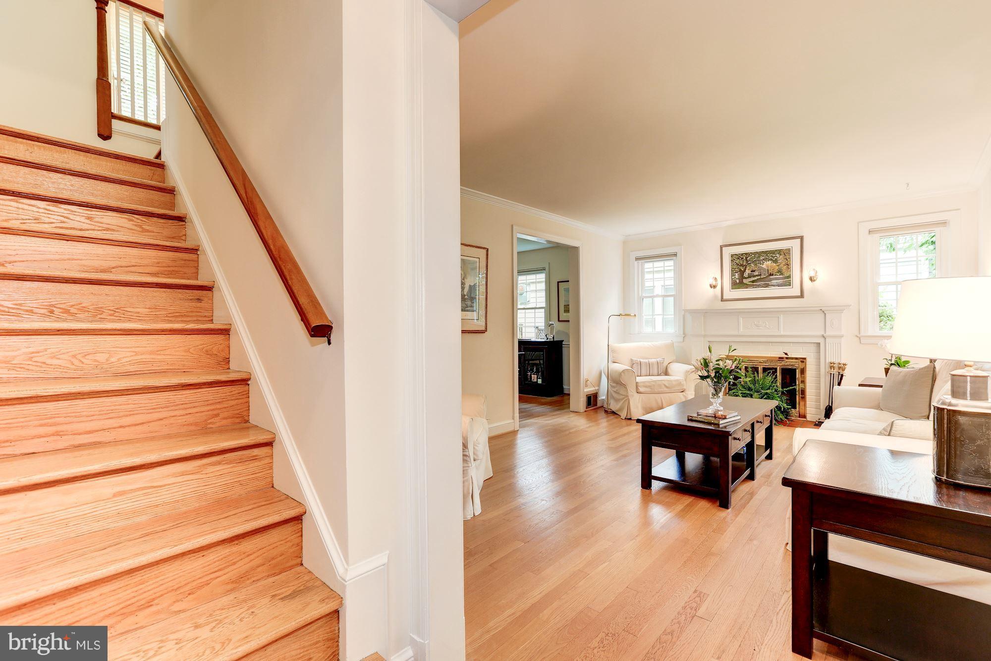 7105 Fairfax Road Bethesda, MD 20814 - Photo 3 of 17 a living room with furniture and a wooden floor