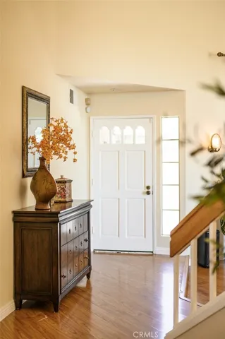a view of entryway with wooden floor