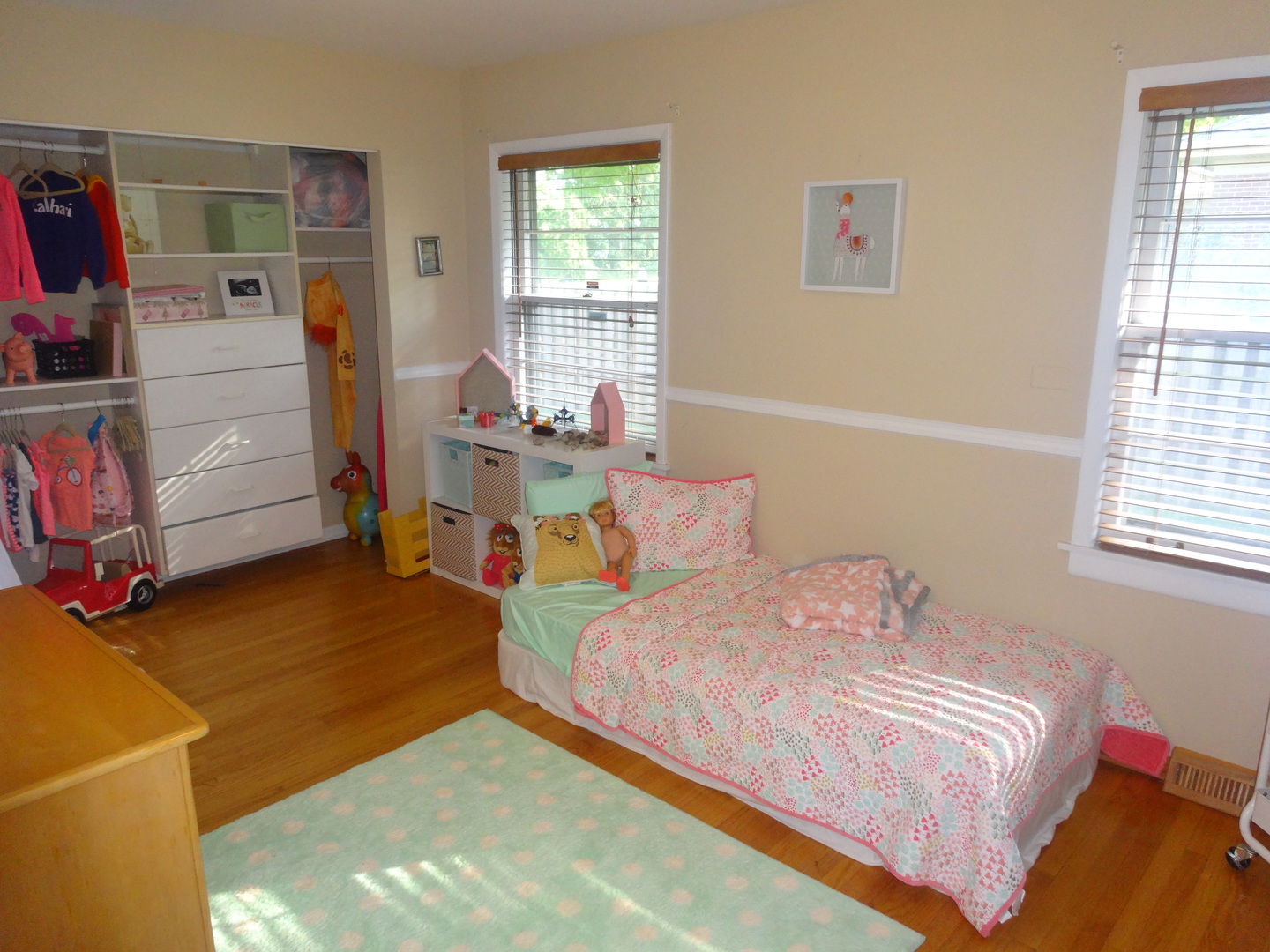 22W678 Poplar Road Glen Ellyn, IL 60137 - Photo 11 of 37 a bedroom with a bed and a window