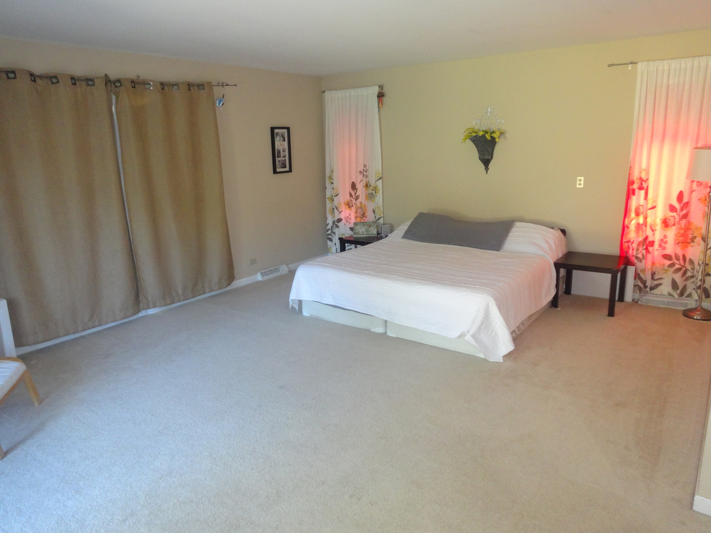 22W678 Poplar Road Glen Ellyn, IL 60137 - Photo 12 of 37 a bedroom with a bed and a table