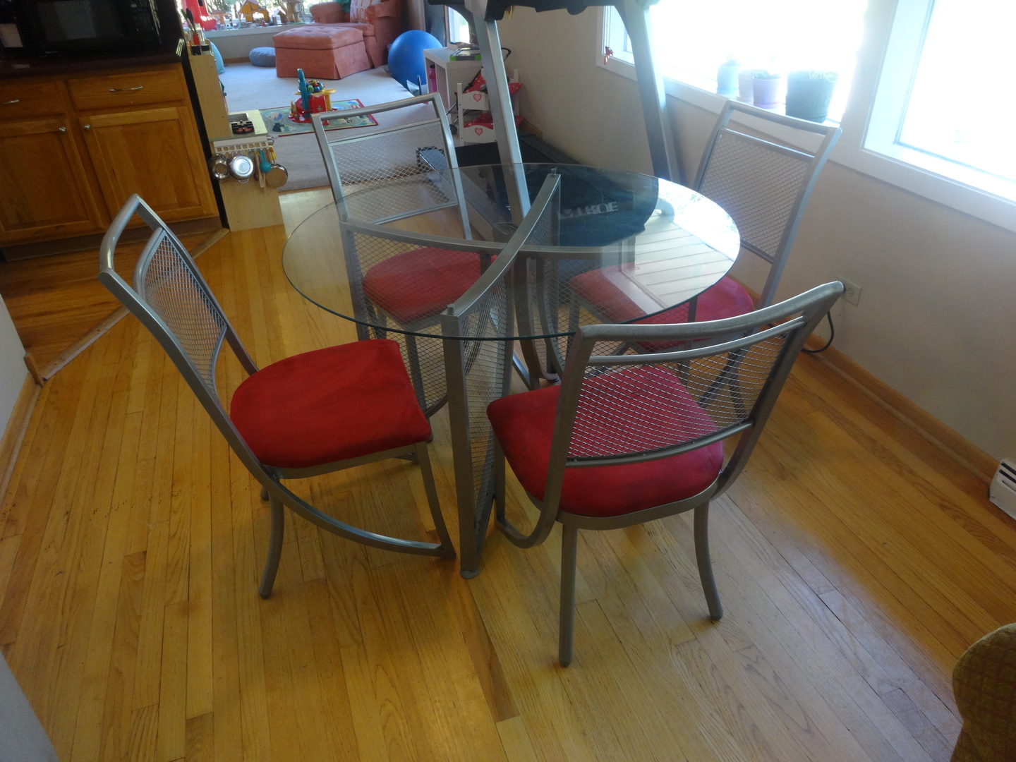 22W678 Poplar Road Glen Ellyn, IL 60137 - Photo 13 of 37 a room with table chairs and wooden floor
