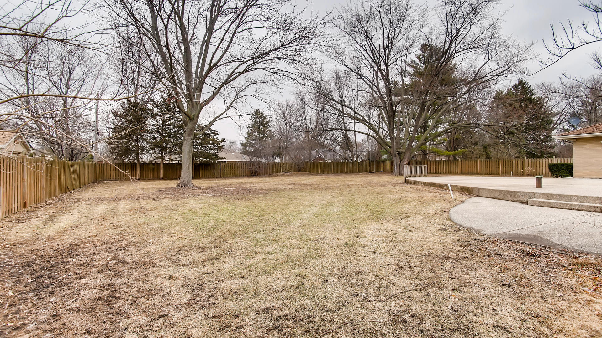 22W678 Poplar Road Glen Ellyn, IL 60137 - Photo 31 of 37 a house with trees in front of it