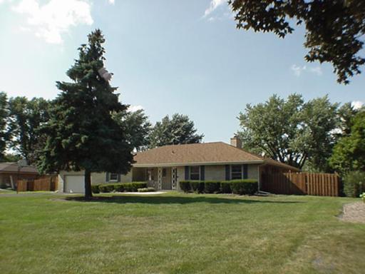 22W678 Poplar Road Glen Ellyn, IL 60137 - Photo 34 of 37 a front view of a house with garden
