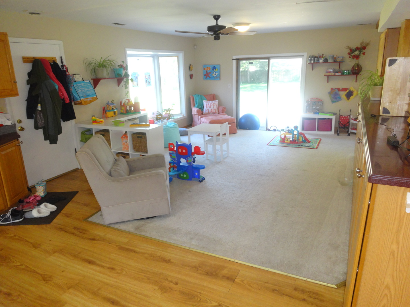22W678 Poplar Road Glen Ellyn, IL 60137 - Photo 9 of 37 a room with furniture and a flat screen tv