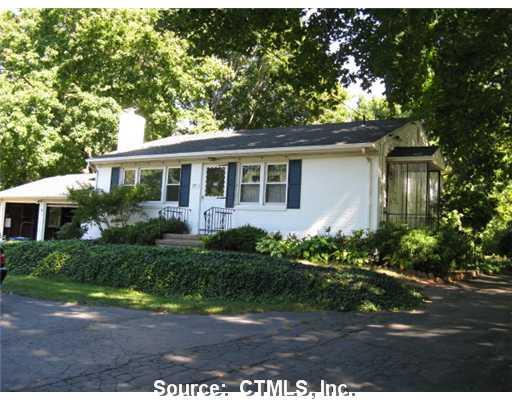 1811 Ridge Road North Haven, CT 06473 - Photo 1 of 1 front view of a house with a yard
