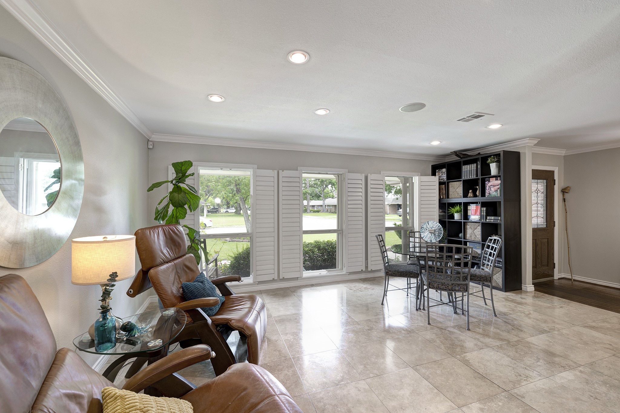 1111 Clovis Road Houston, TX 77008 - Photo 4 of 32 Natural light, provided by these three eastern-facing windows, floods the core of the home.
