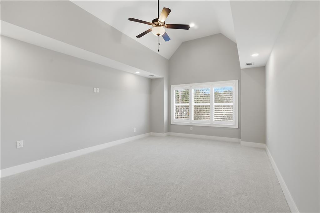 12 Bridgestone Way Cartersville, GA 30120 - Photo 27 of 46 wooden floor in an empty room with a window