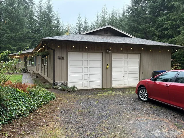 a house with trees in the background