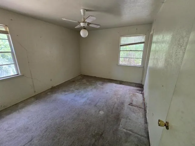 an empty room with windows