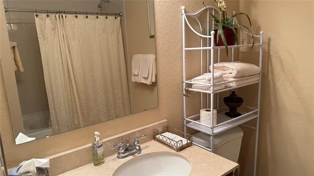 a view of a workspace with furniture