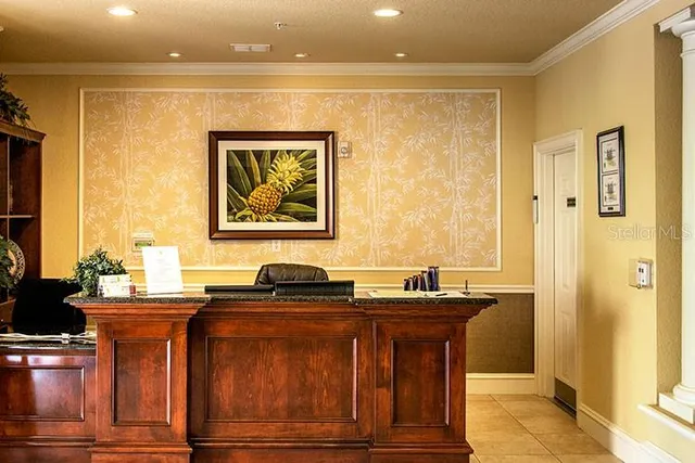 a view of a swimming pool with a house in the background