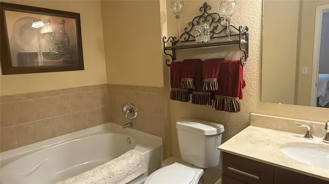 a bathroom with a glass door shower