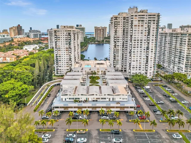 a view of hallway with wooden floor and couch