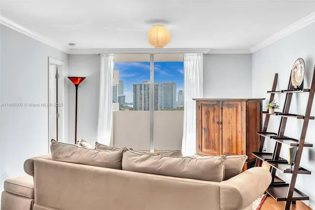 a living room with a rug and a couch