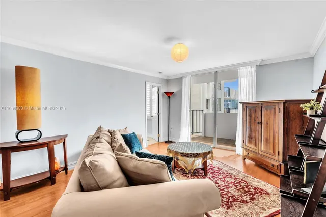 a living room with furniture and a rug