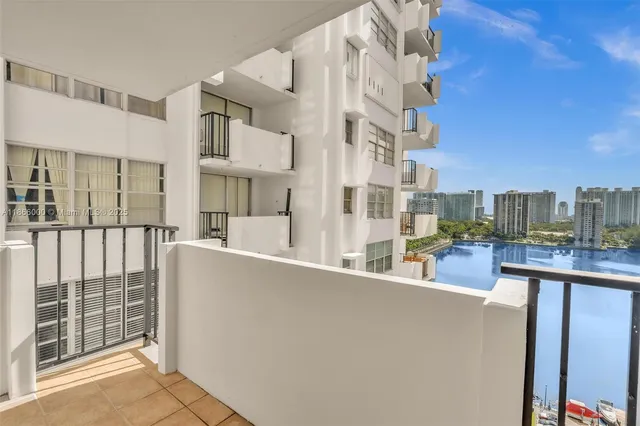a bathroom with a bathtub sink vanity and a mirror