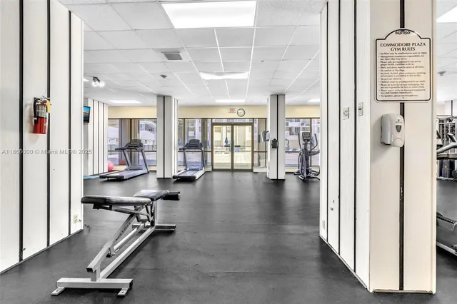a view of a swimming pool with outdoor seating