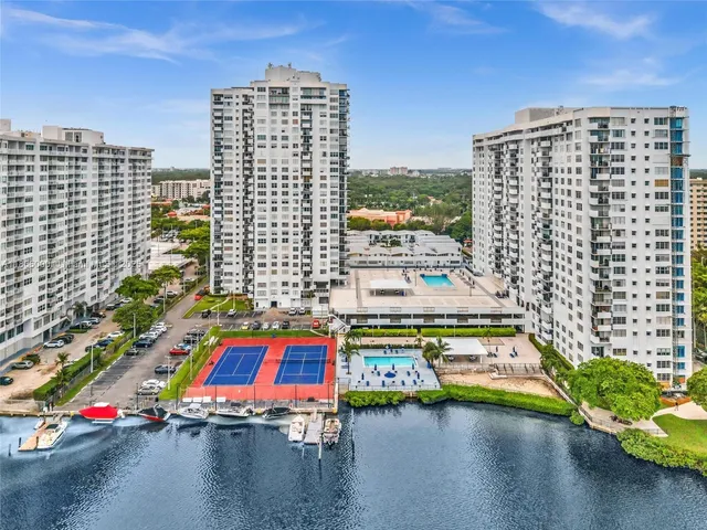 a potted plant sitting on the side of a building