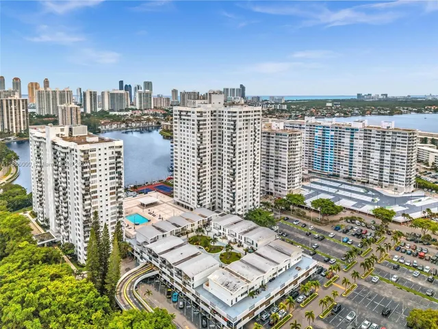 a view of a city with tall buildings