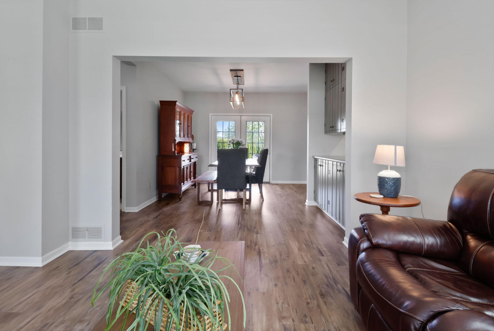 12819 Grant Street Crown Point, IN 46307 - Photo 11 of 42 a living room with furniture and a wooden floor
