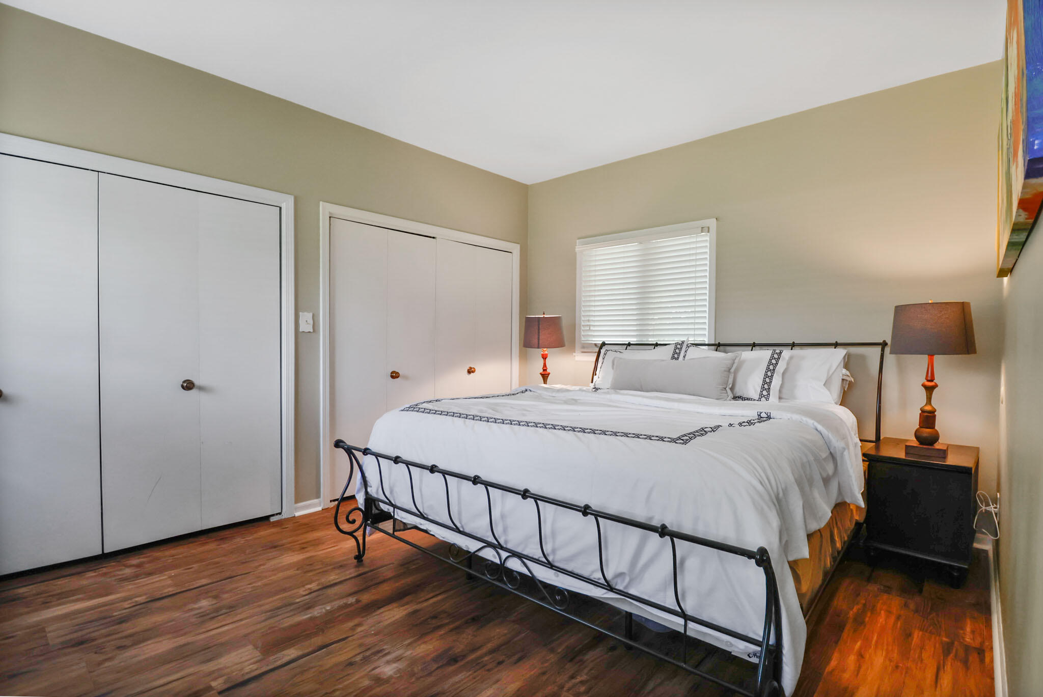 12819 Grant Street Crown Point, IN 46307 - Photo 14 of 42 a bedroom with a bed and a night stand