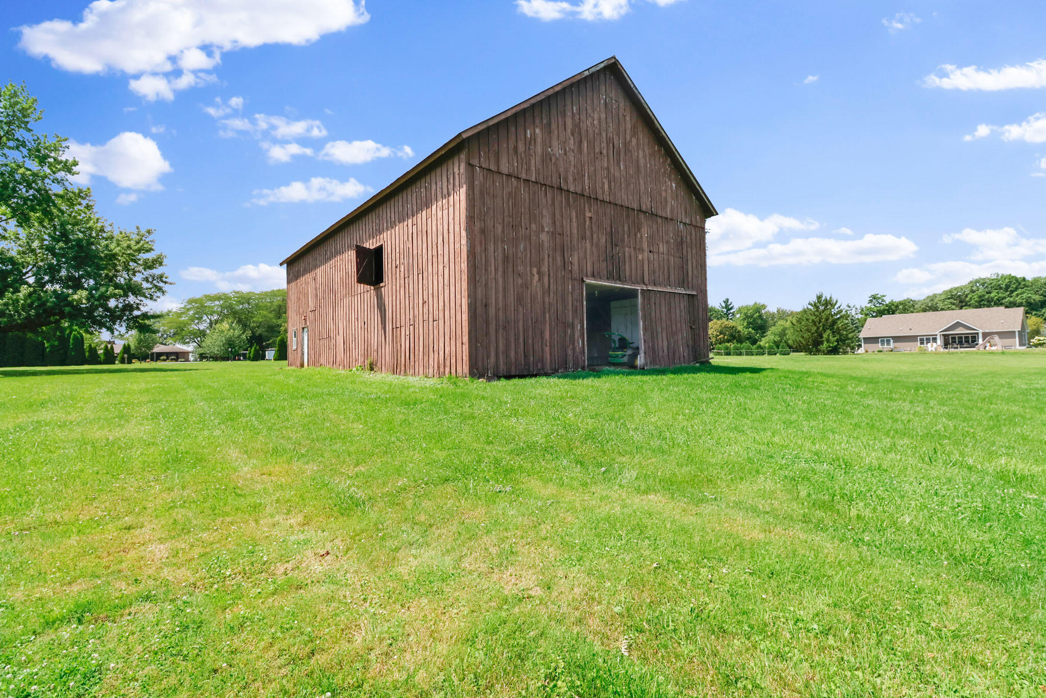 12819 Grant Street Crown Point, IN 46307 - Photo 32 of 42 a view of a back yard of the house