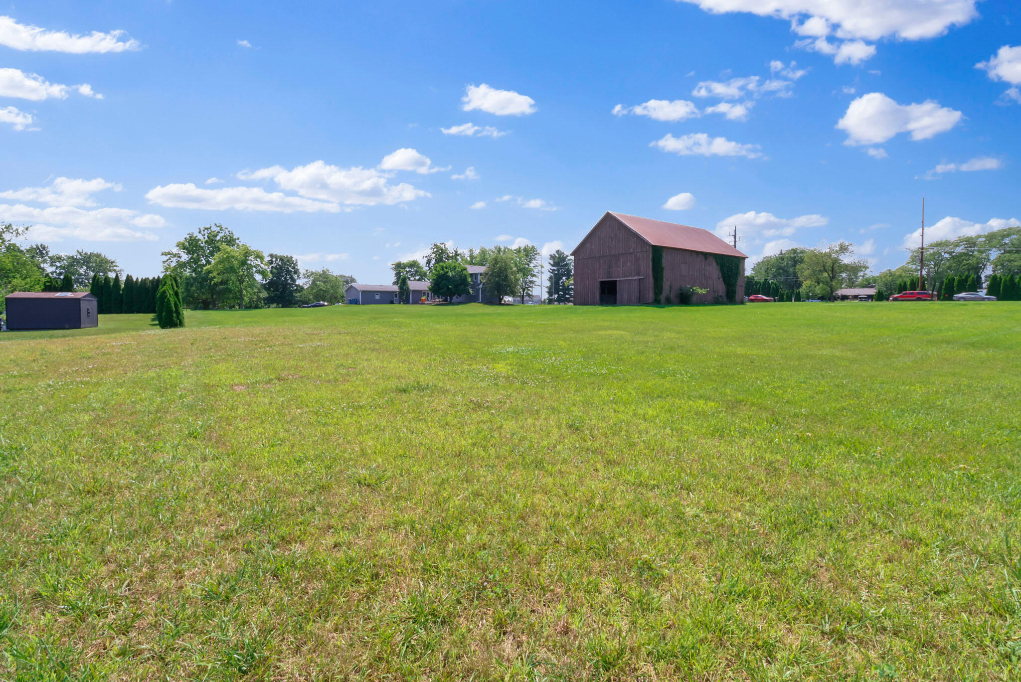 12819 Grant Street Crown Point, IN 46307 - Photo 34 of 42 a view of a house with a big yard