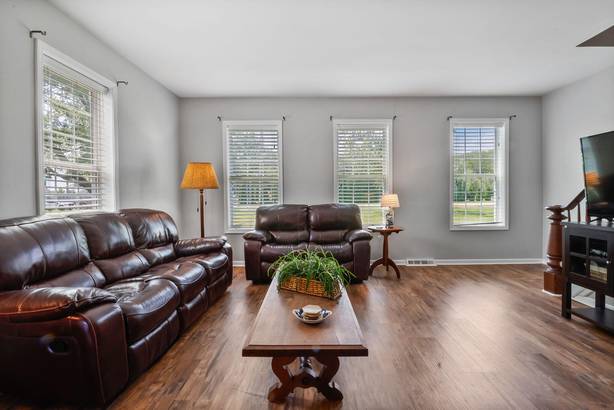 12819 Grant Street Crown Point, IN 46307 - Photo 9 of 42 a living room with furniture and a window