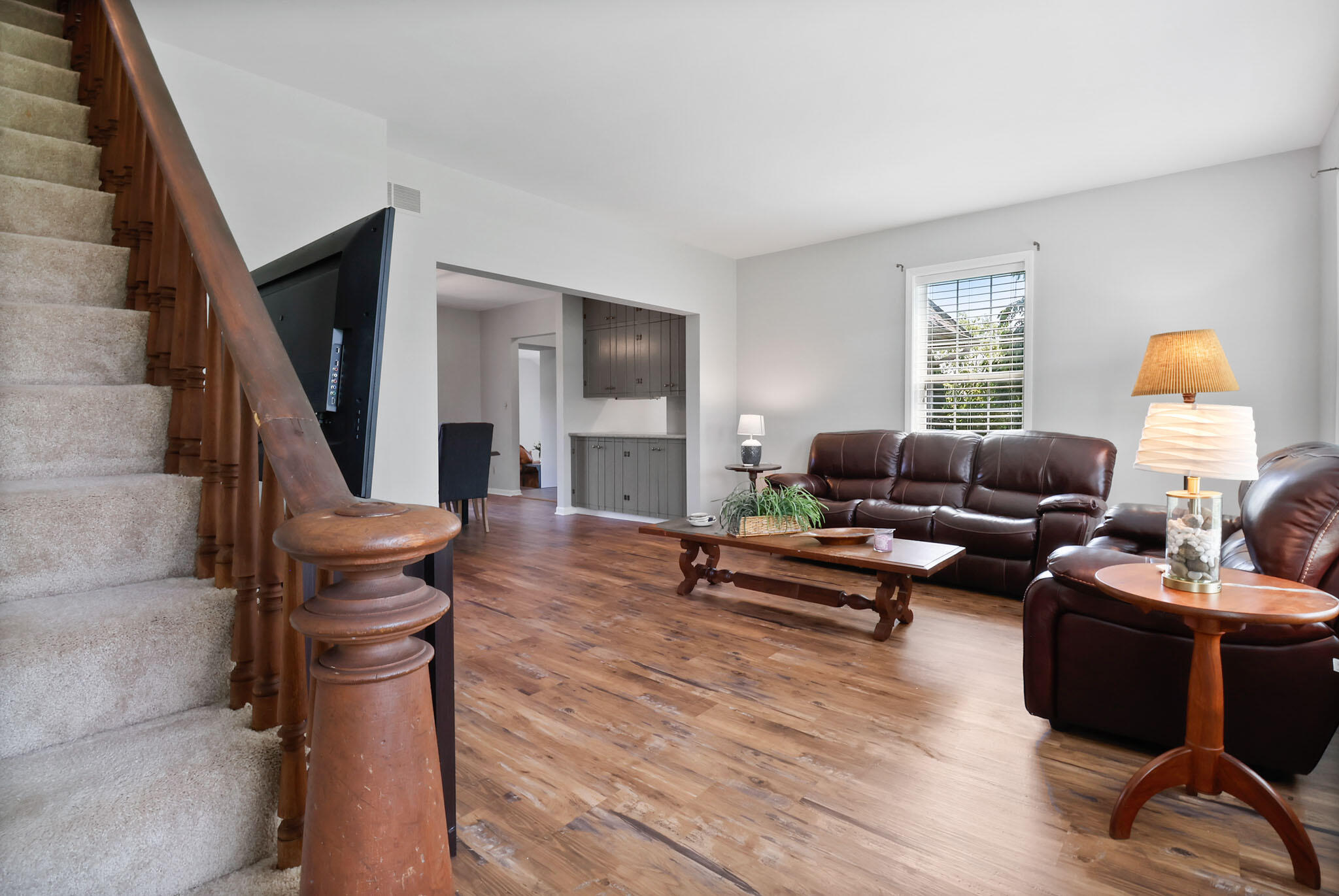 12819 Grant Street Crown Point, IN 46307 - Photo 10 of 42 a living room with furniture and a fireplace