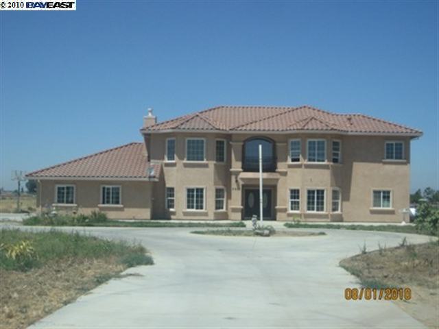 2610 Sunset Road Knightsen, CA 94513 - Photo 1 of 1 a front view of a house with a garden