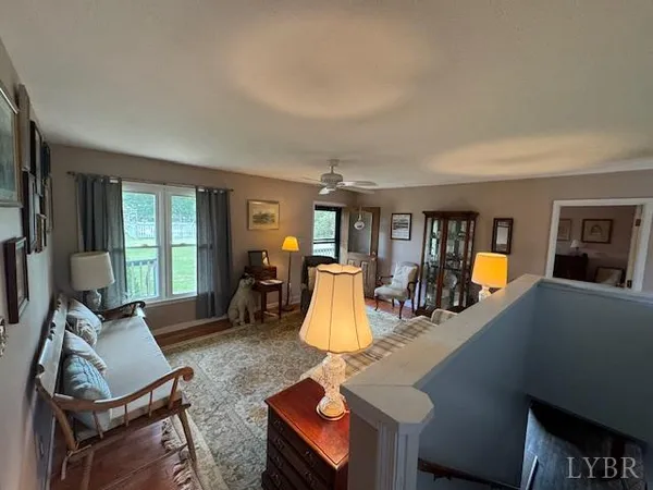 a kitchen with stainless steel appliances a refrigerator sink and microwave