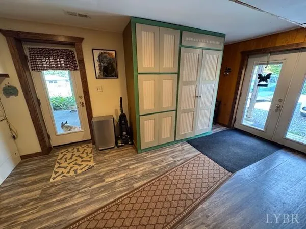 a bathroom with a sink a toilet and shower curtain