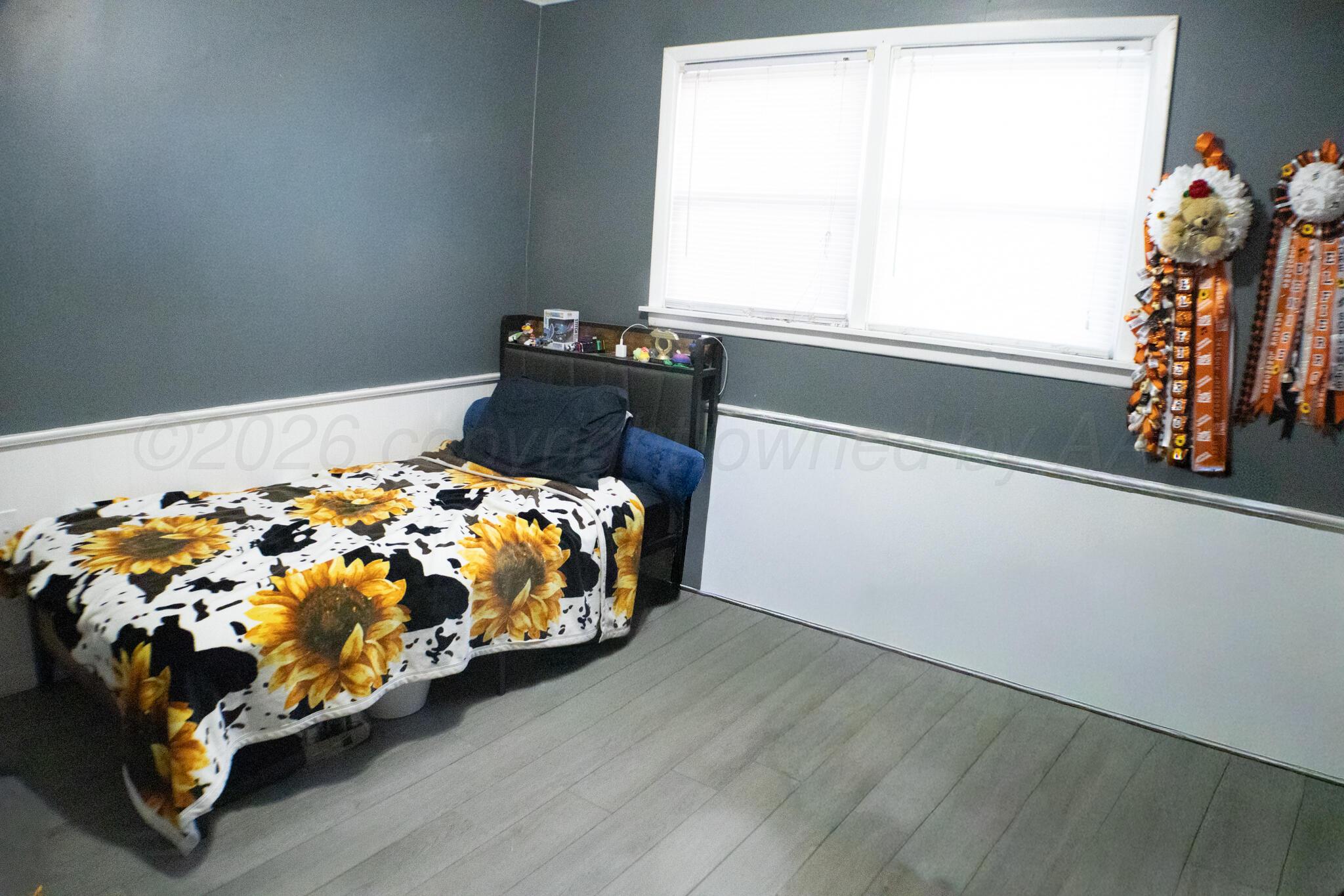 4711 South Rusk Street Amarillo, TX 79110 - Photo 24 of 24 a bedroom with a bed and a window