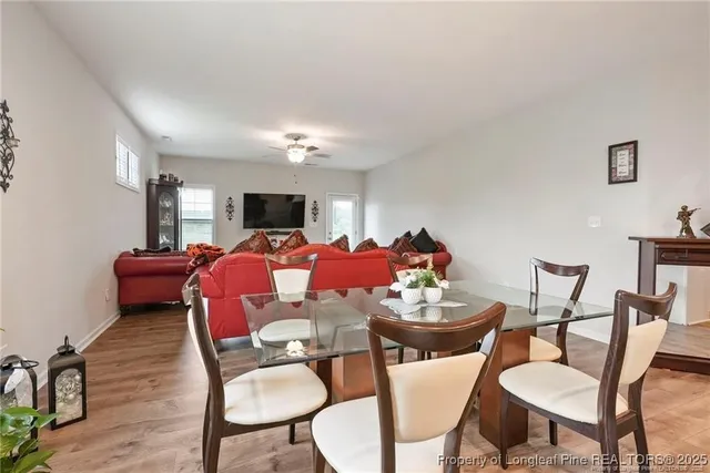 a view of a dining room with furniture