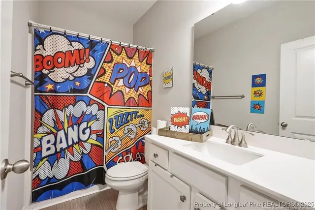 a bathroom with a sink and a toilet