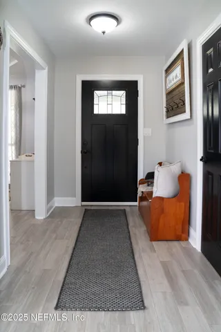 a view of livingroom with furniture and closet