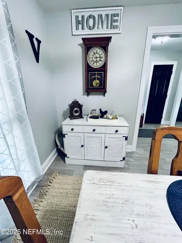 a kitchen with stainless steel appliances a sink stove and cabinets