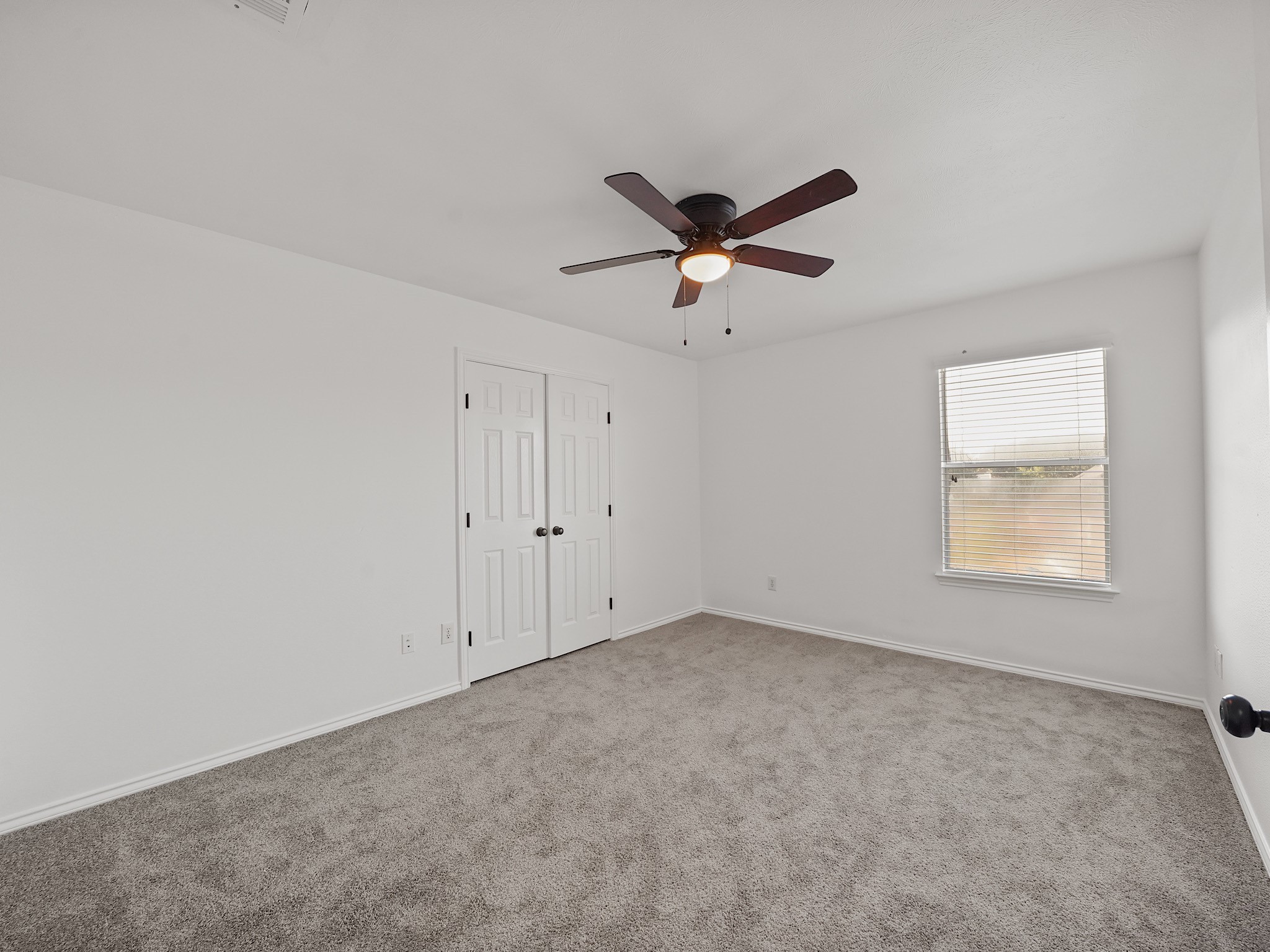 14206 Windy Ridge Lane Rosharon, TX 77583 - Photo 11 of 15 This freshly updated bedroom features new paint and carpet for a modern touch.